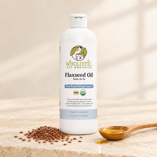 Wholistic Pet Organics Flaxseed Oil with whole flaxseeds and golden flaxseed oil in a wooden spoon.